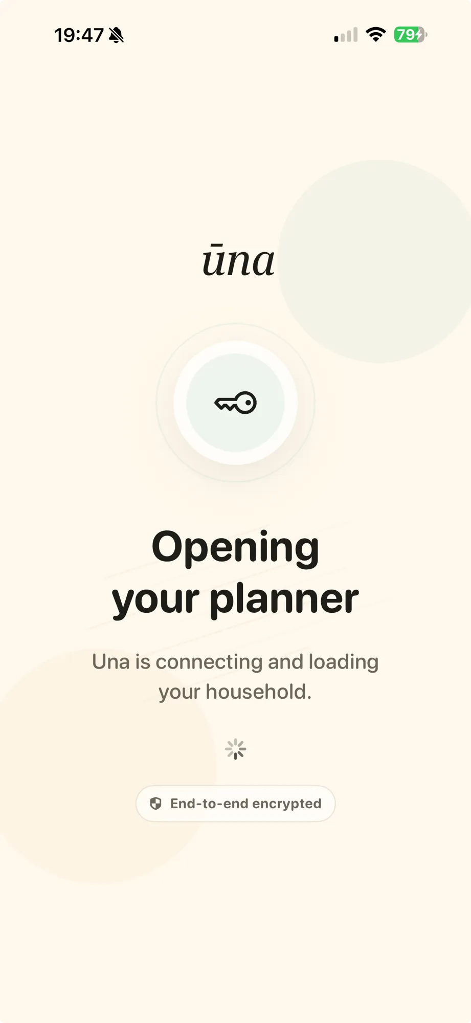 Ūna “Opening your planner” screen while it connects and loads the household